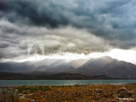 Picture of Dramatic clouds above lake near Mendoza in Argentinian Andes